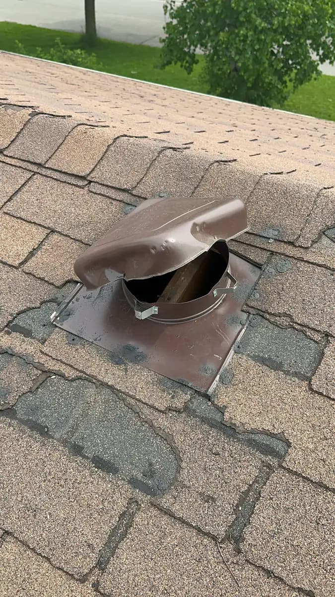 Roof vent cover with a broken opening along its lower edge